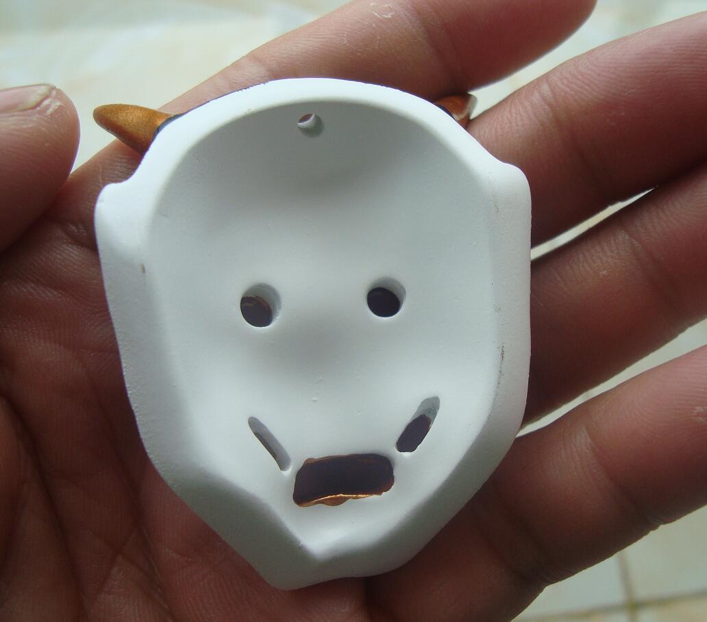 Ethnic smiley face necklace