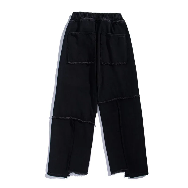 Distressed washed jeans with raw edges - Black