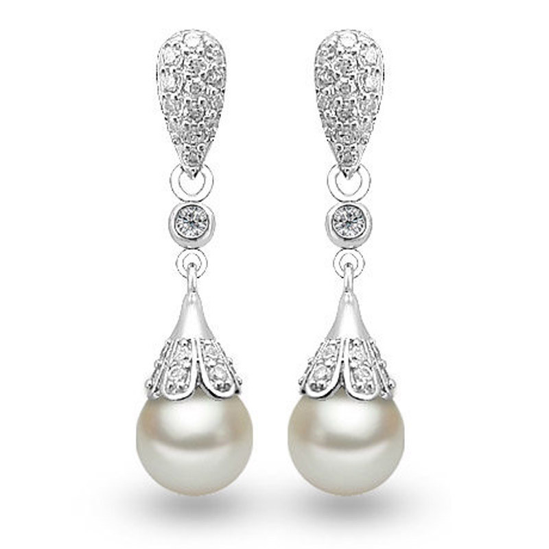 Heart-shaped long pearl earrings