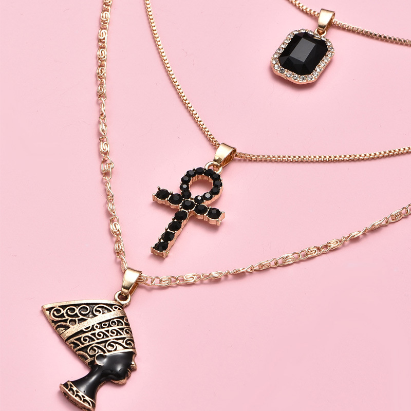Multi-layered crucifix pendant