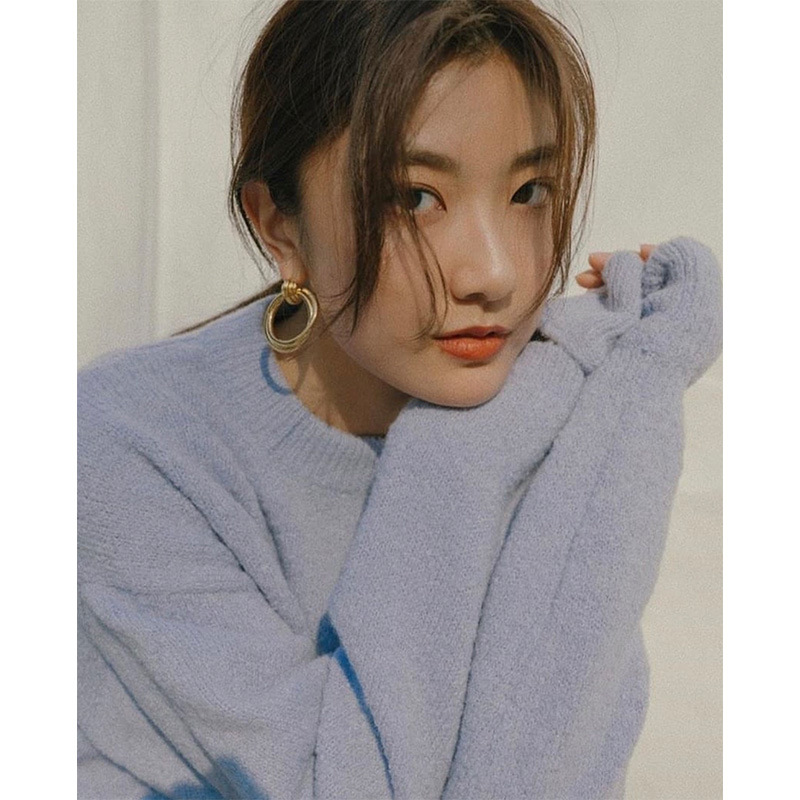 Large cross-wound copper earrings