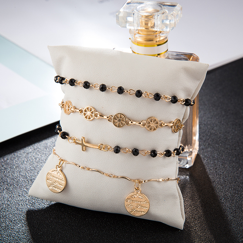 Four-piece alloy cross bracelet
