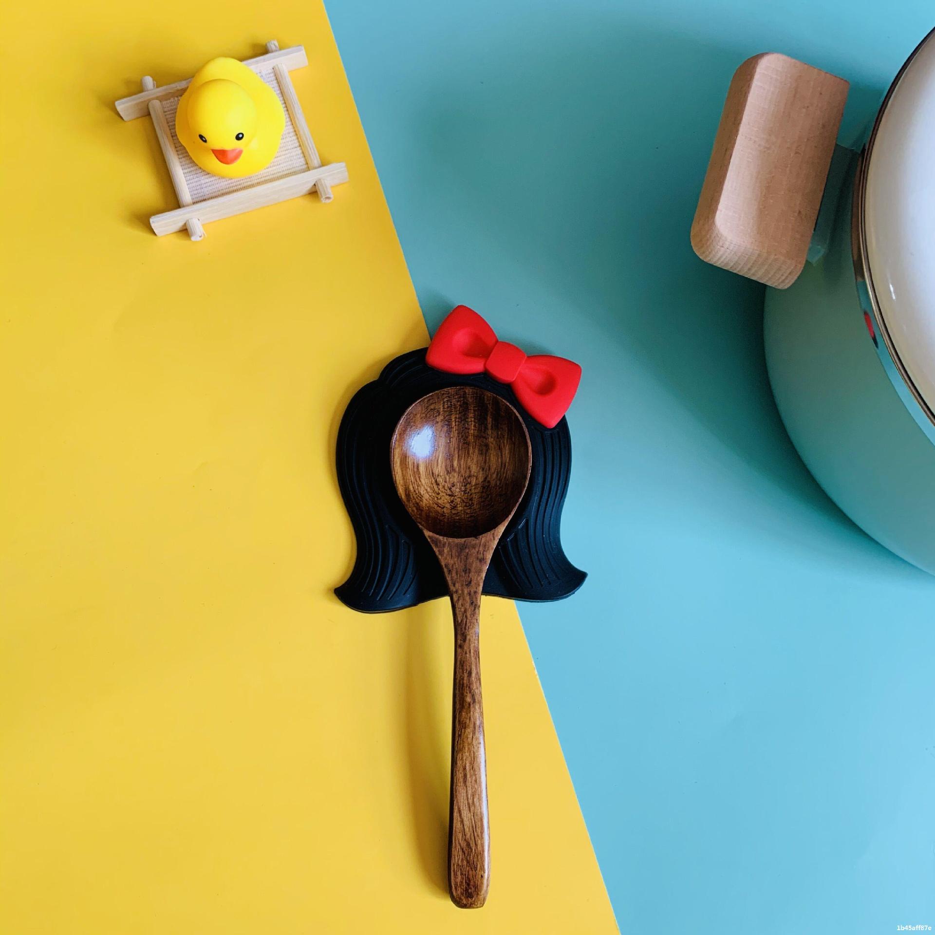 Silicone spoon holder