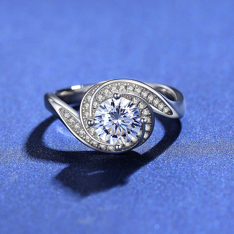 Four Prong Torsion Arm Diamond Ring