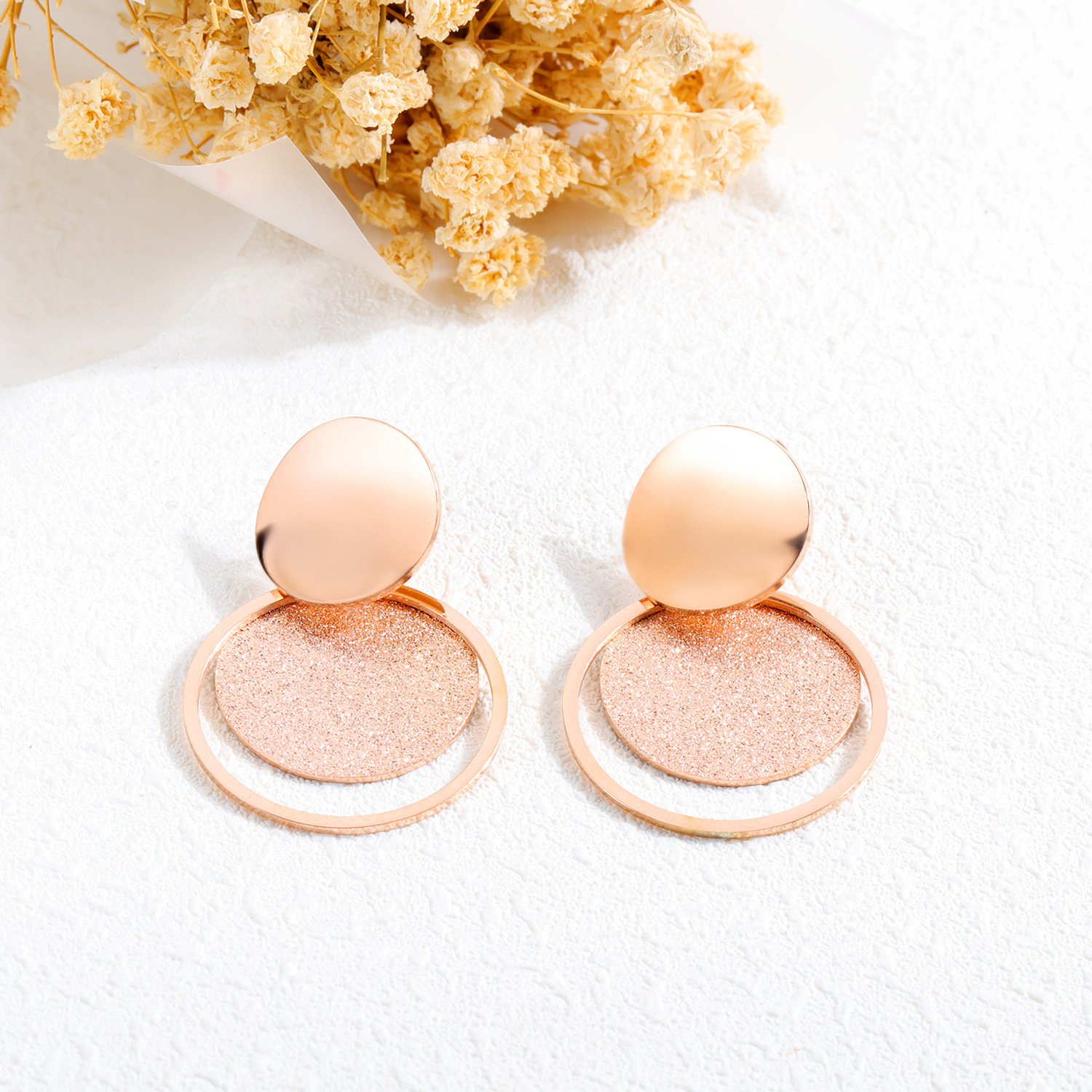 Golden frosted round earrings