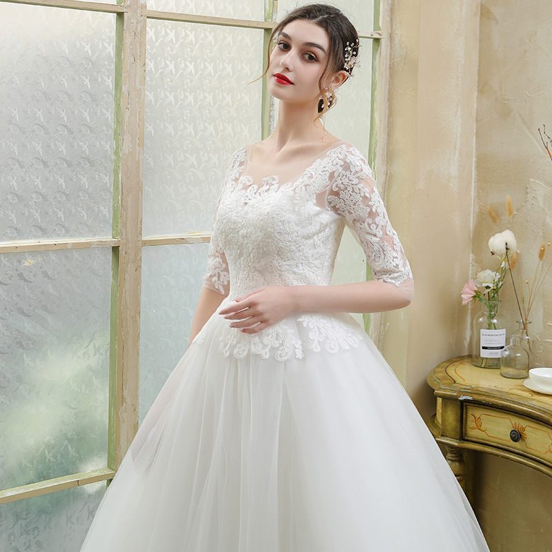 Bride's long-sleeved forest lace tail wedding dress