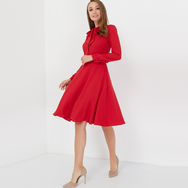 Long sleeve solid color knee-length dress