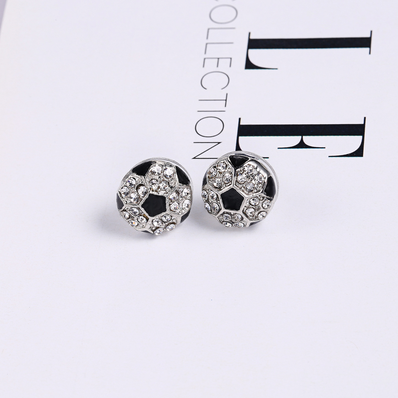 Football rhinestone ear studs