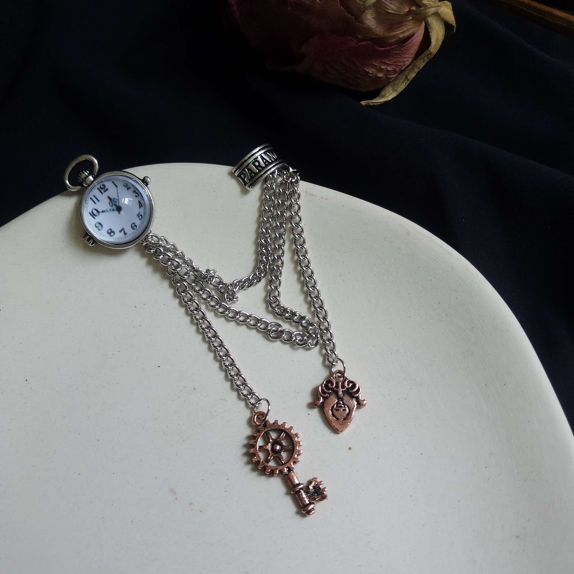 Watch key ear bone clip integrated earrings