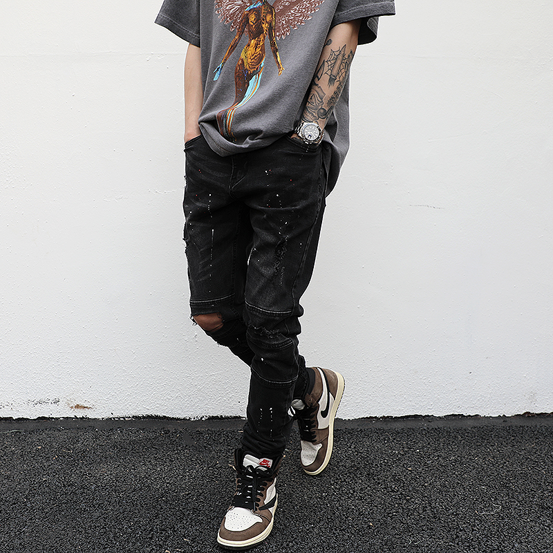 Elastic feet ripped trousers
