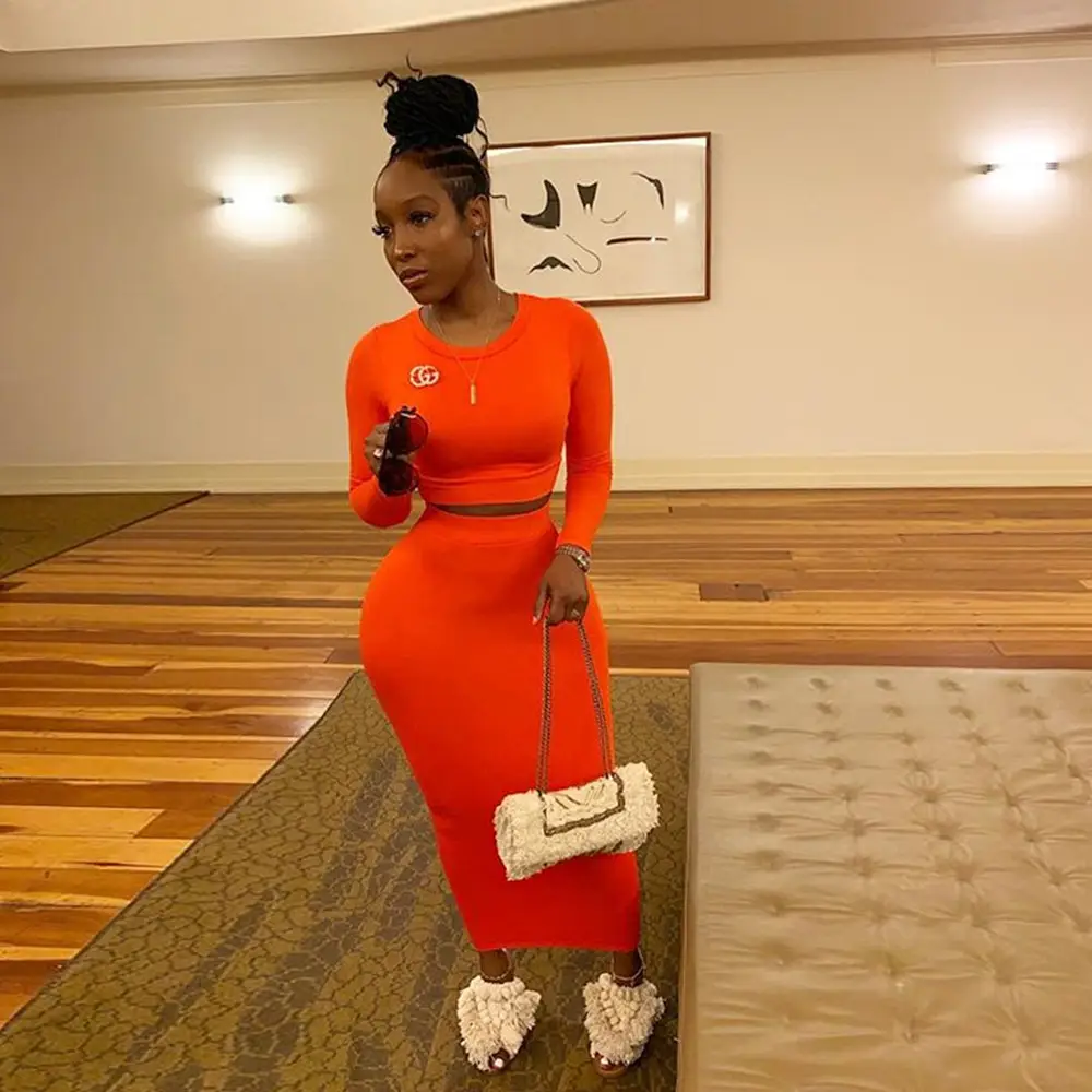 Two-piece long-sleeved top and mid-length skirt