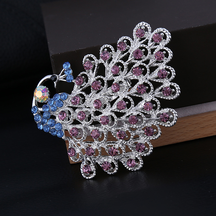 Title 3, Peacock diamond corsage Dazzling elegance for s...