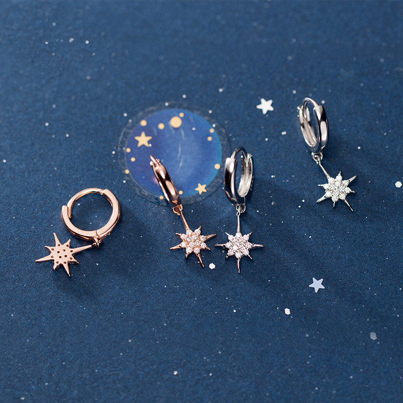 Temperament star earrings with diamonds