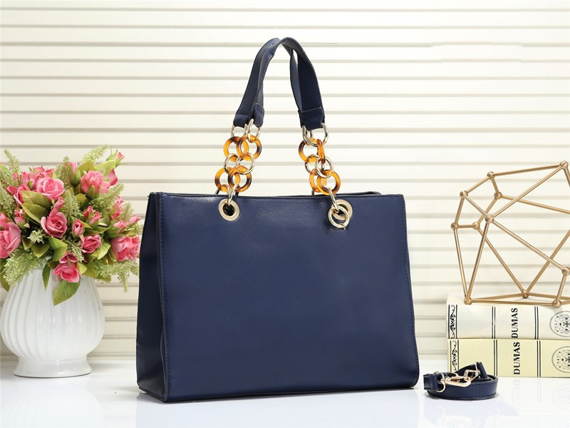 Title 1, Hand-held cross pattern womens bag, a stylish ...