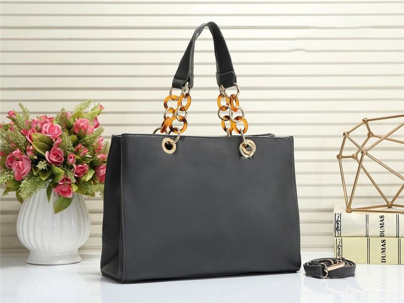 Title 8, Hand-held cross pattern womens bag, a stylish ...