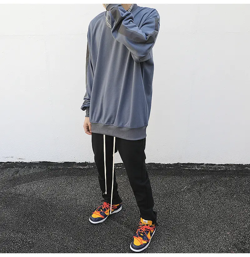 Falling shoulders solid color loose sweater