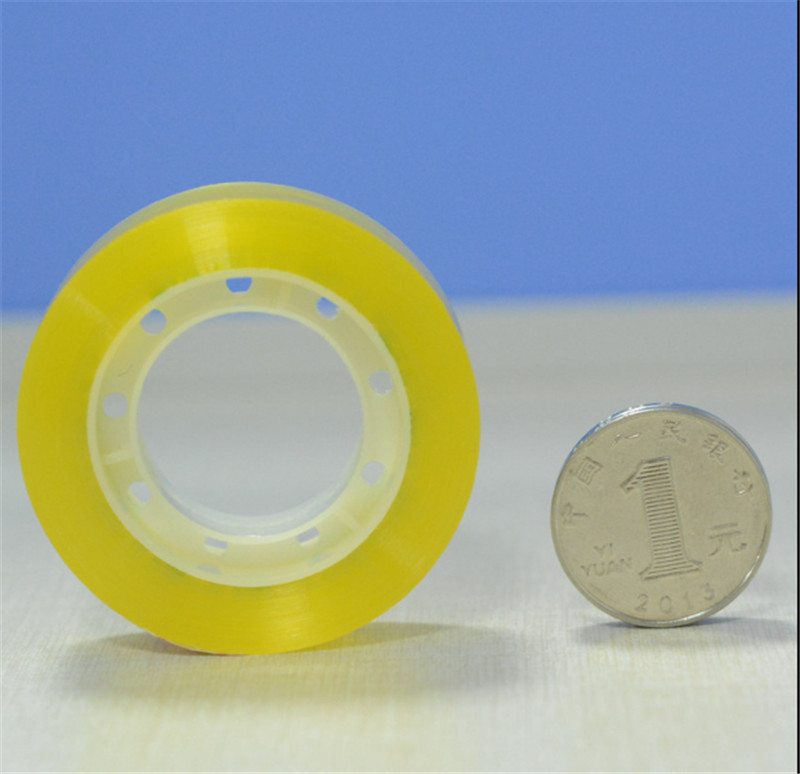 Adhesive transparent stationery tape