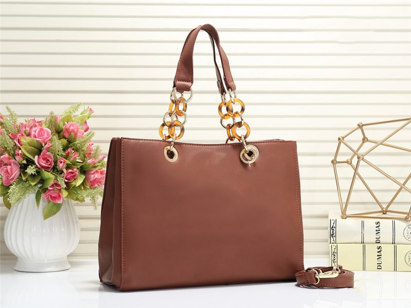 Title 7, Hand-held cross pattern womens bag, a stylish ...