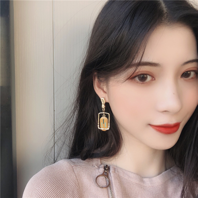 Vintage metal asymmetric earrings