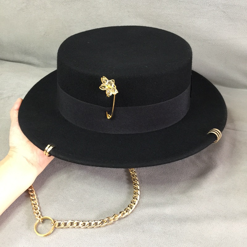 Female retro black top hat