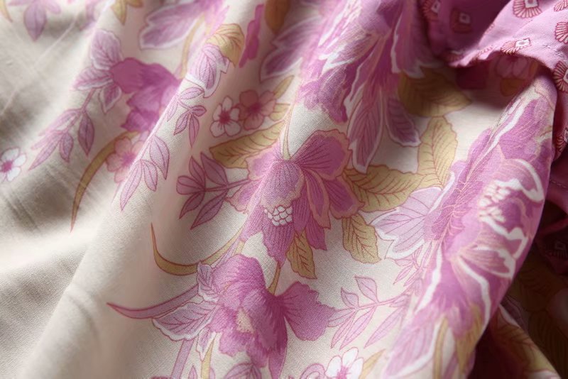 Positioning printed sling dress