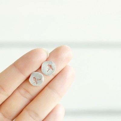 Birds stand in the branches hollowed out bird ear studs