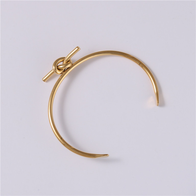 Titanium steel plated 18K knotted lover knot bracelet