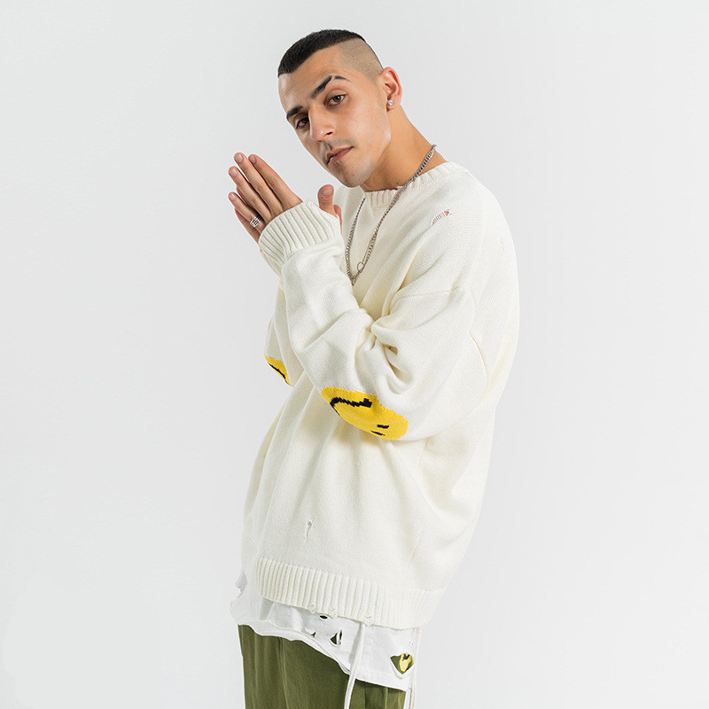 Distressed smiley face sweater