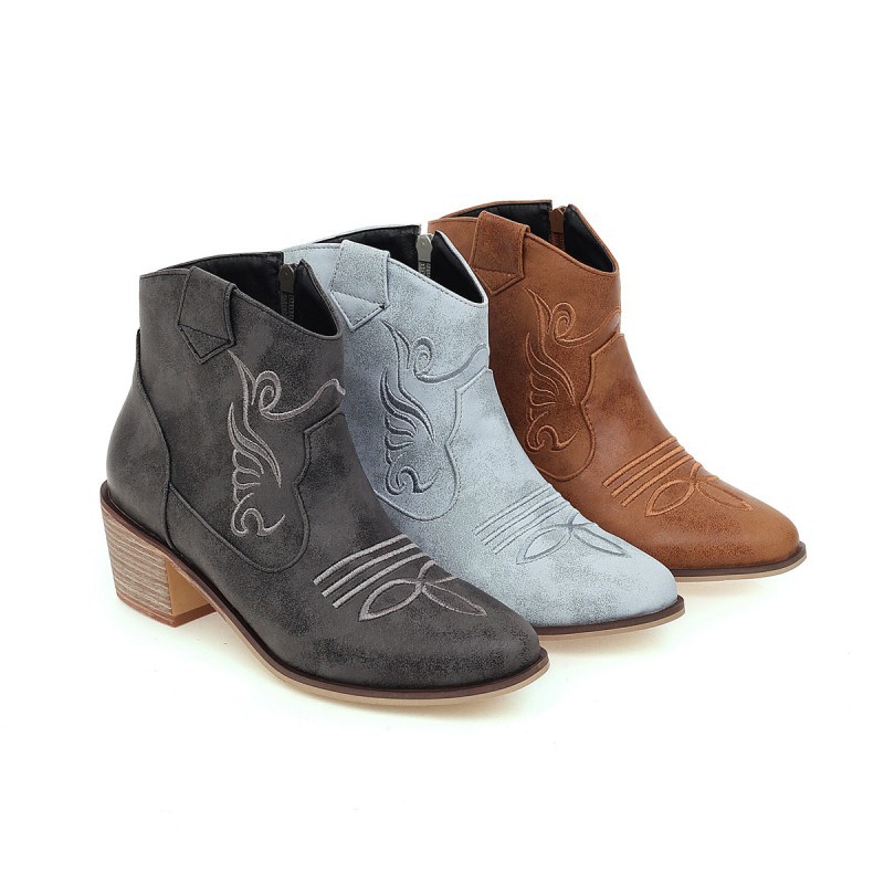 Women's carved thick heel ankle boots