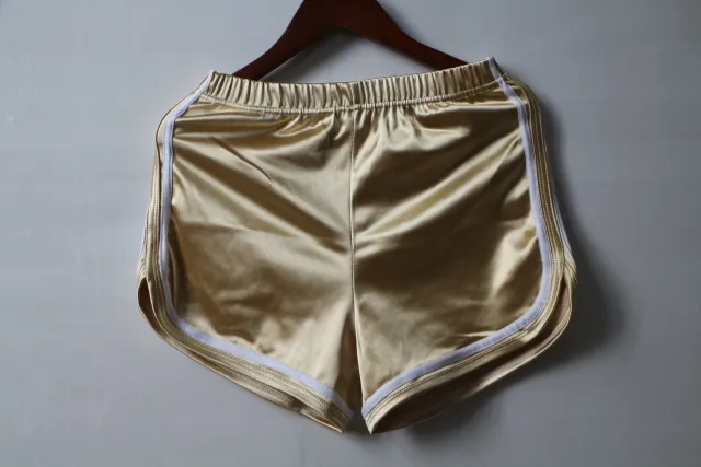 All match Glossy Elastic High Waist Sports Shorts Gold - Shop at LoveMi