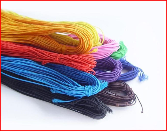 The Beads Are Threaded With String And Cored Thread