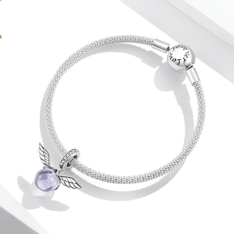 Pendant with Wings Inlaid With Glass Beads and Beaded Jewelry