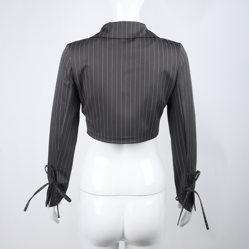 The Woman With The Navel-Baring V-Neck Blazer