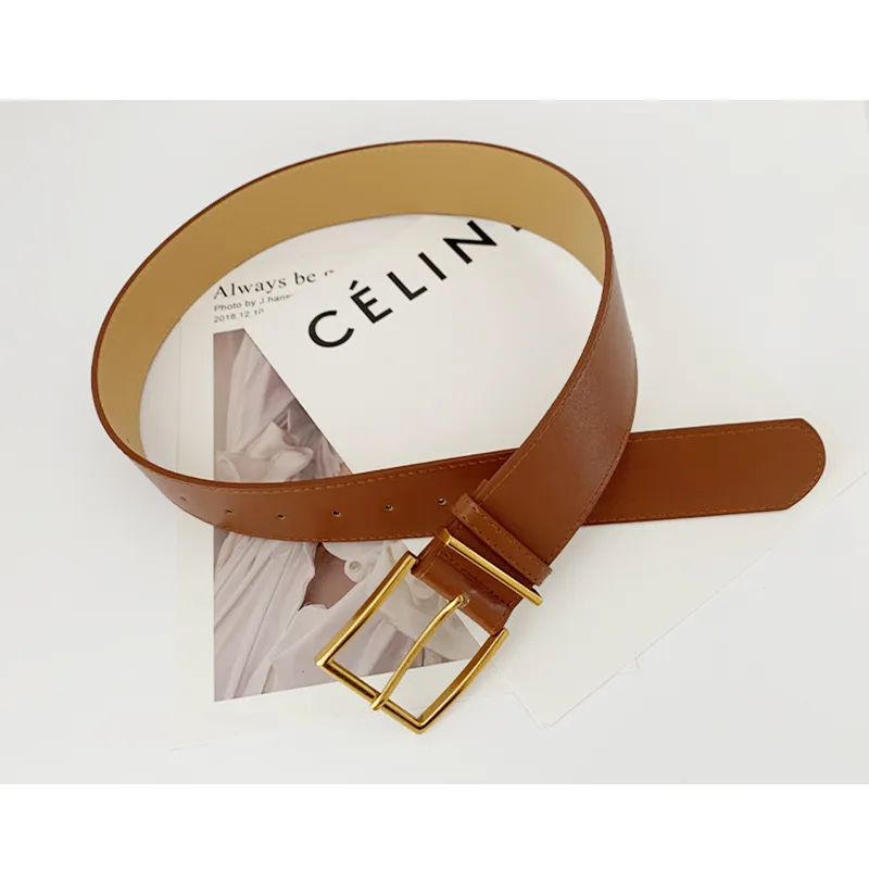 A Stylish Go-to Suit For Women With A Wide Black Belt - Brown