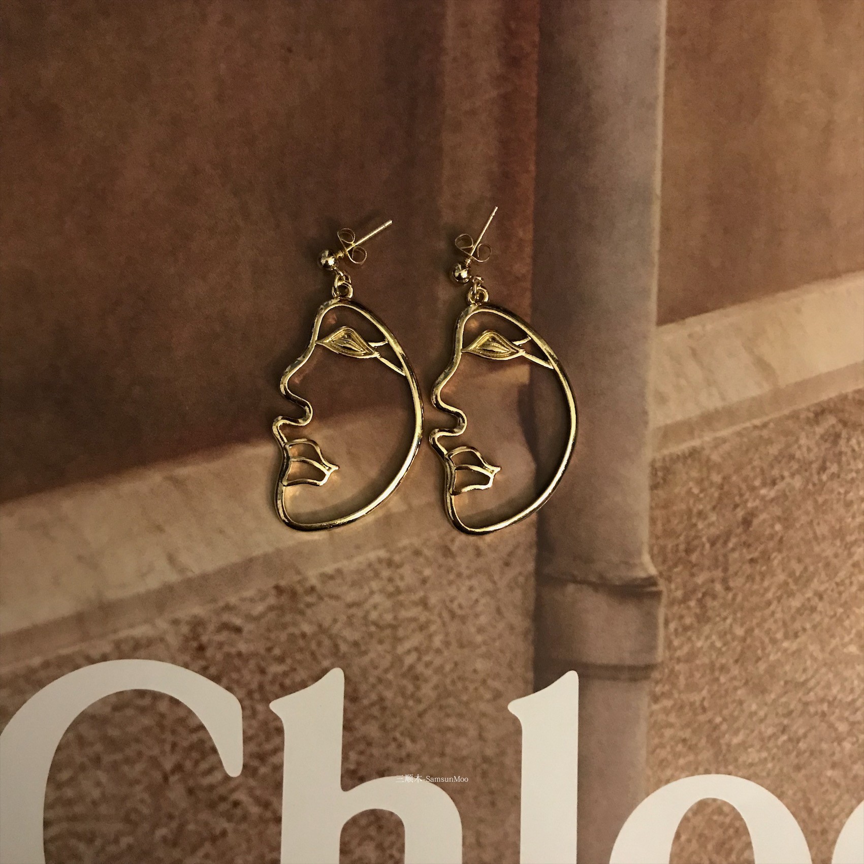 Foreign trade personalities funny Earrings hollowed out face palm palm earring stereo contour face studs