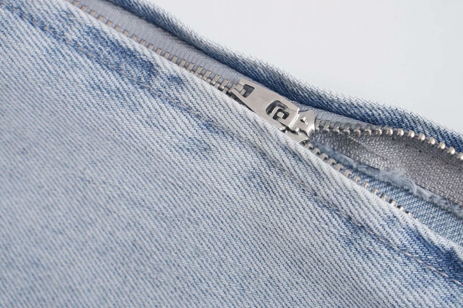 Sleeveless denim dress with padded shoulders