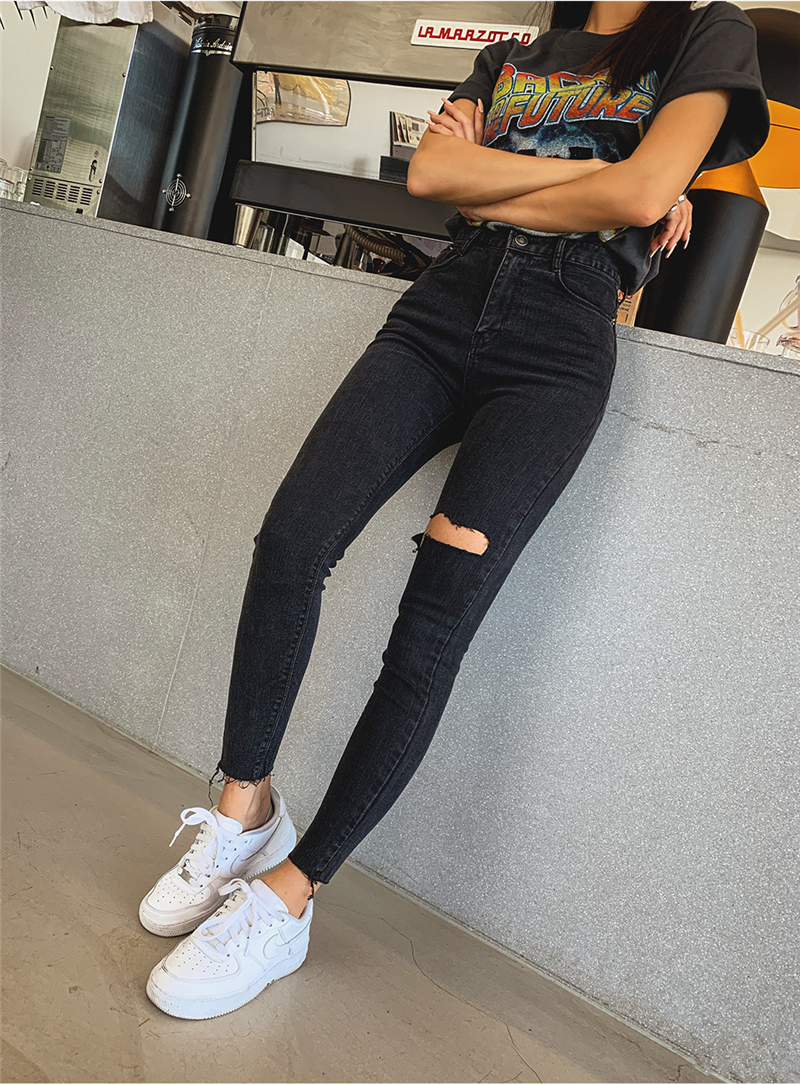 Raw-edge ripped high-waisted jeans