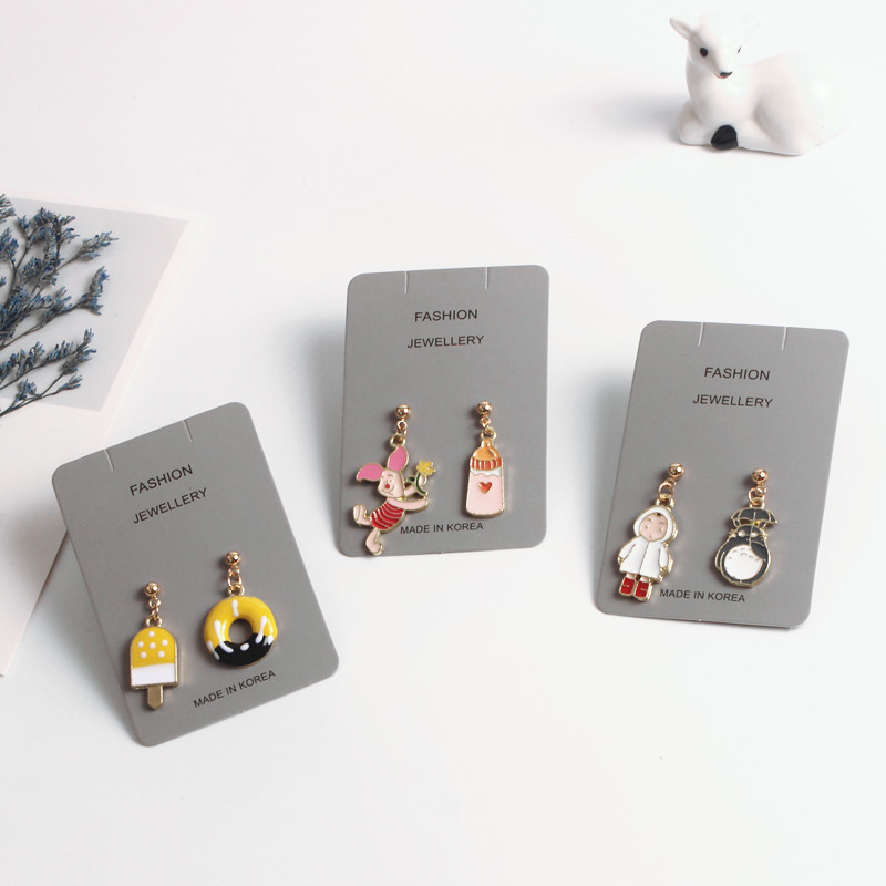 Cartoon asymmetric earrings