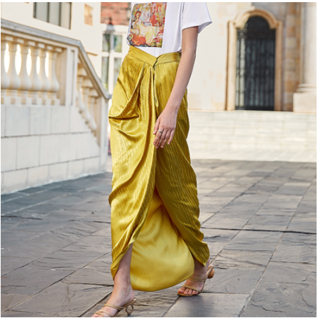 Asymmetrical long skirt with pleated slits