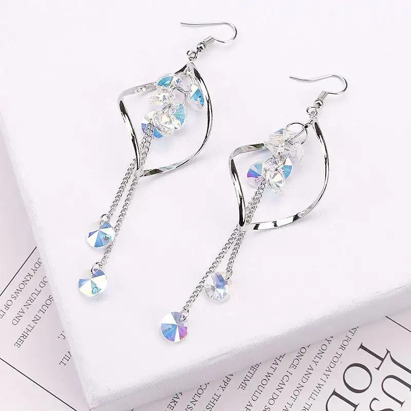 Wavy long crystal earrings