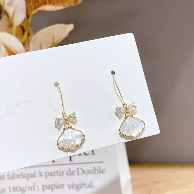Bow Zircon Shell Earrings