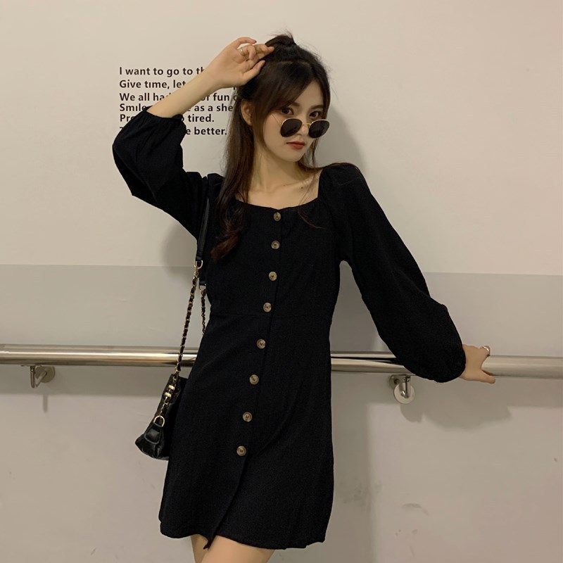 A single breasted black dress