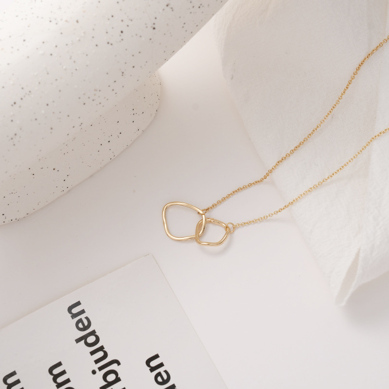 Cross geometric necklace