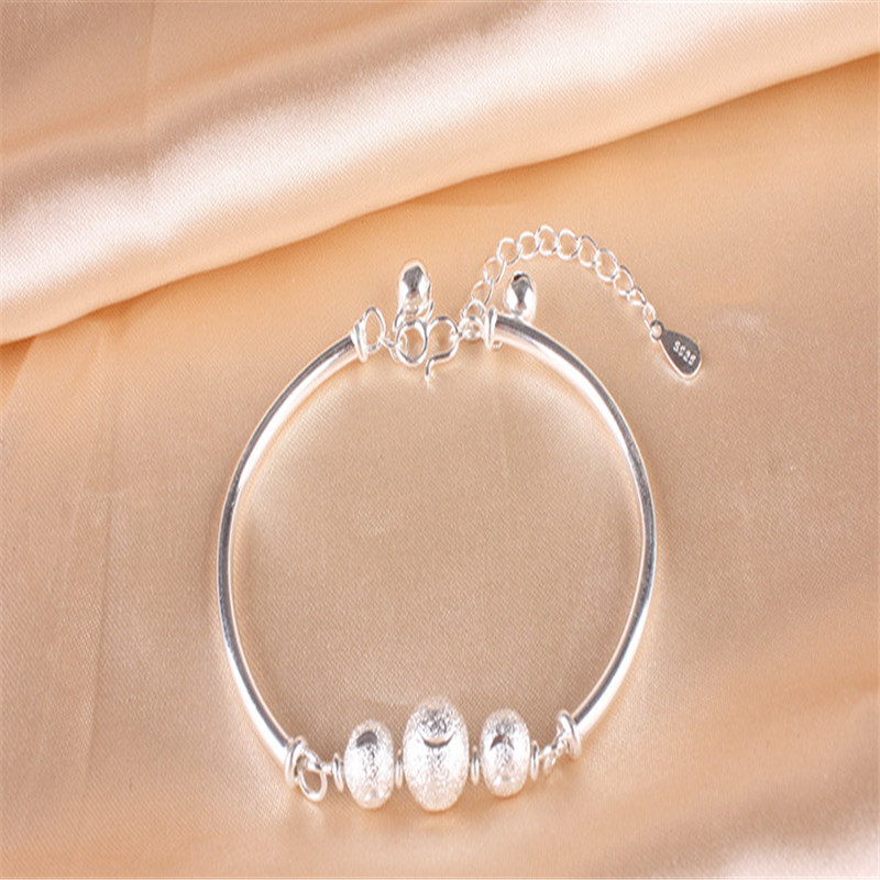 Turning Beads and Bells Silver Plated Bracelet