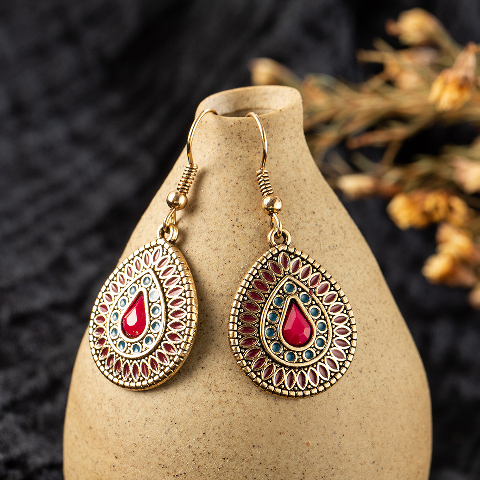 Drop-shaped alloy earrings with gemstones