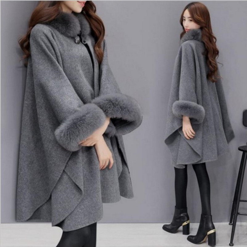 Mid-length woolen coat with fox fur collar