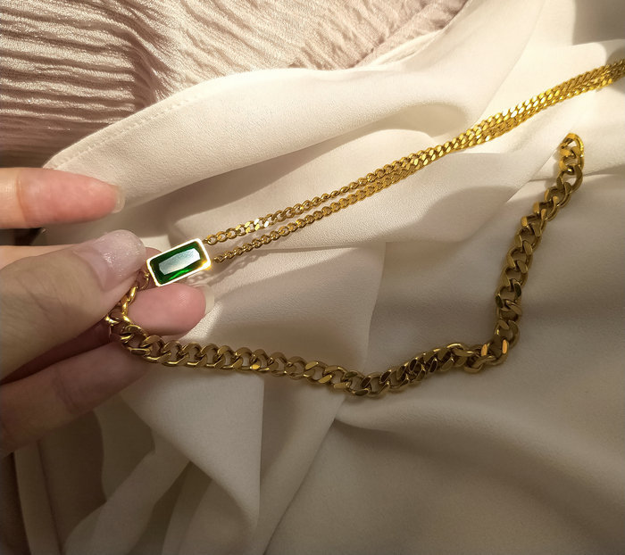 Metallic green neck ring