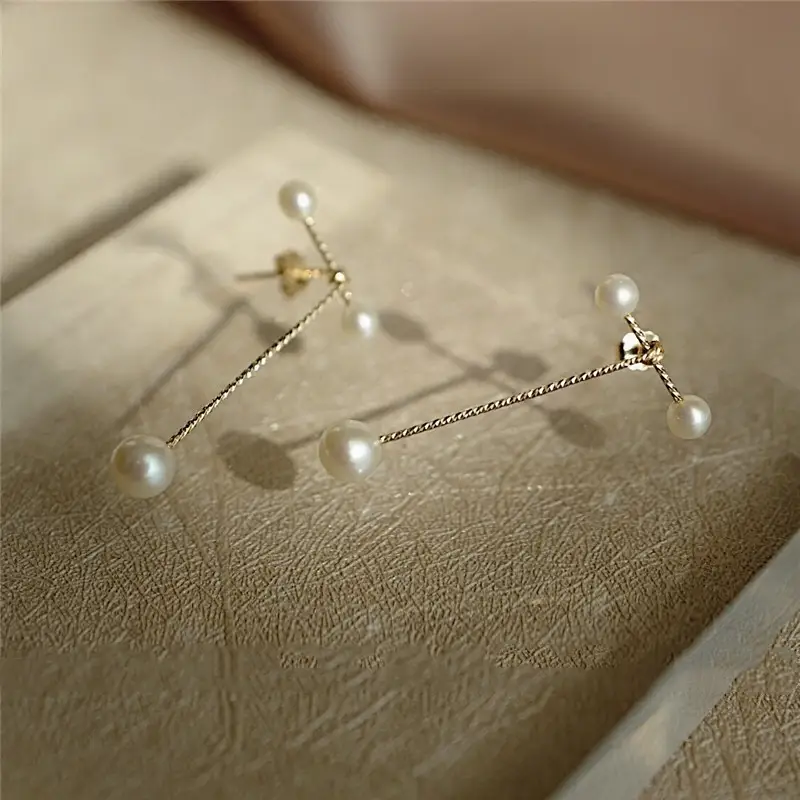 Geometric earrings with pearl earrings