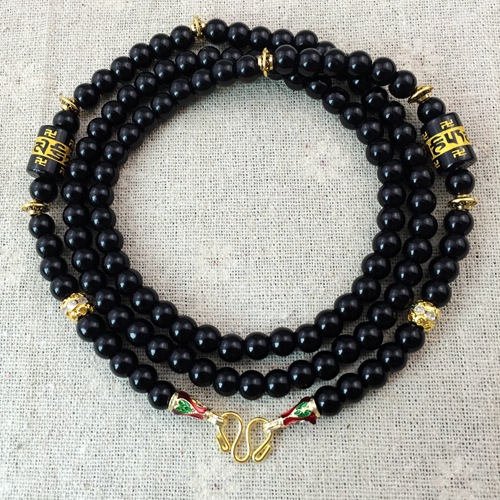 قلادة بوذا بشكل فراشة