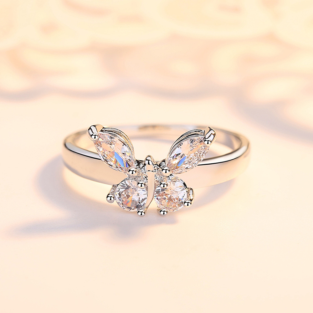 Butterfly inlaid zircon ring